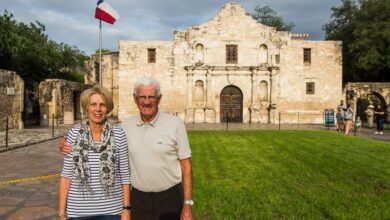 mum and dad standing outside the alamo