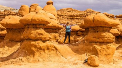 woman standing in a canyon