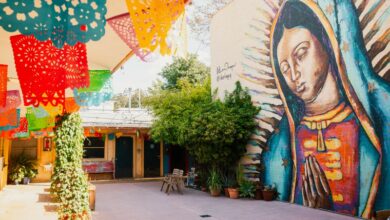huge mural of girl praying placita mx courtyard