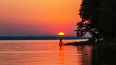 bright red sunset at lake peten itza guatemala